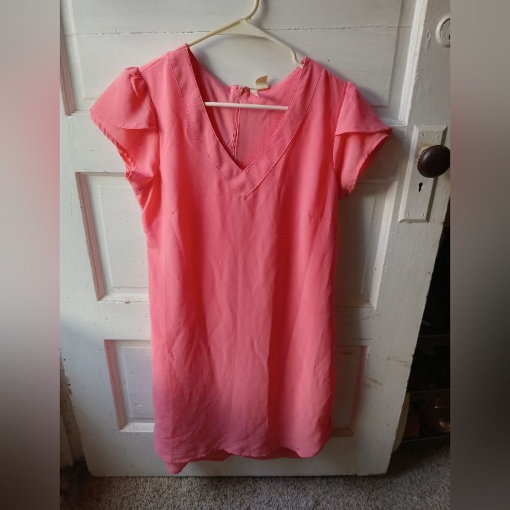 T-Shirt style poly zip-back bold salmon colored summer dress.